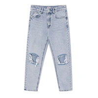 Spodnie damskie Jean Shop jeansy z dziurami niebieskie r. W25