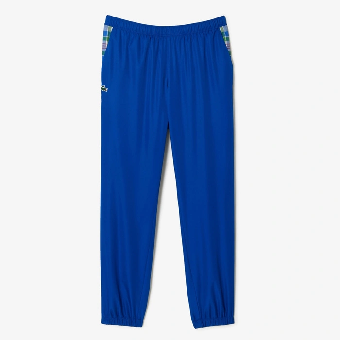 Kompletny męski dres Lacoste Sport spodnie + kurtka niebieski r. XS