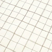 Prześcieradło dziecięce Nobodinoz bawełniane beżowe 70x140 cm 